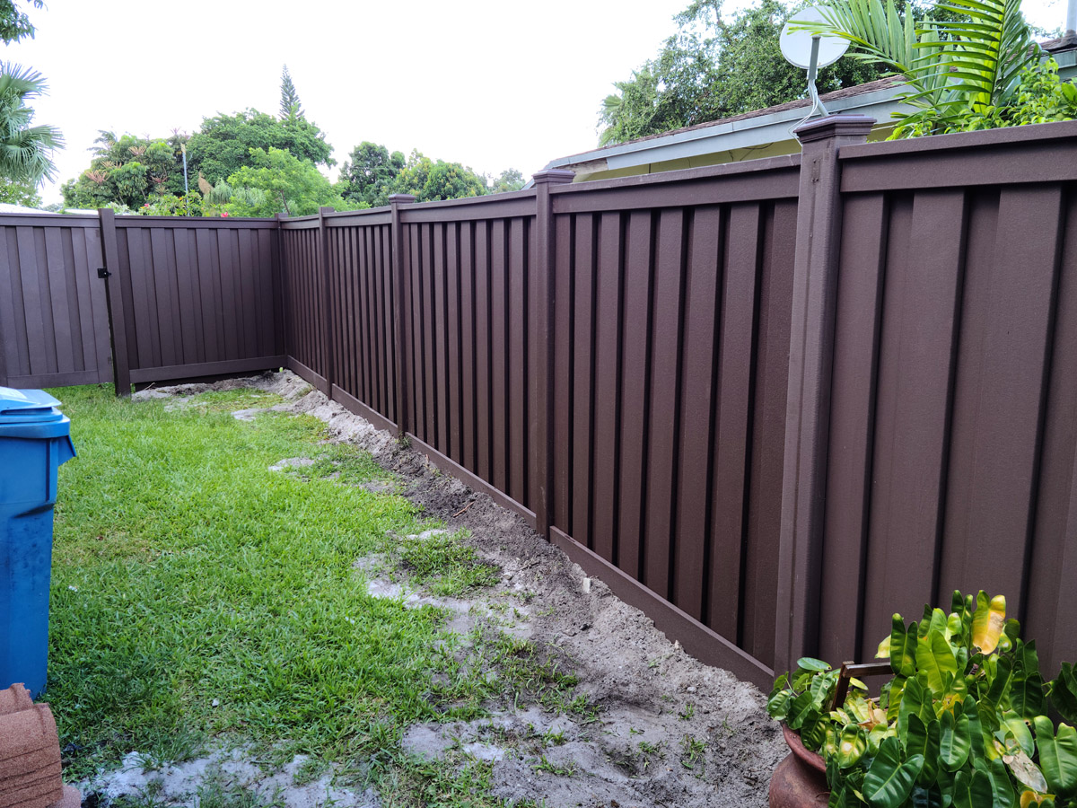 Wood fence construction job(2) Painted wooden fence job in Broward County, Florida