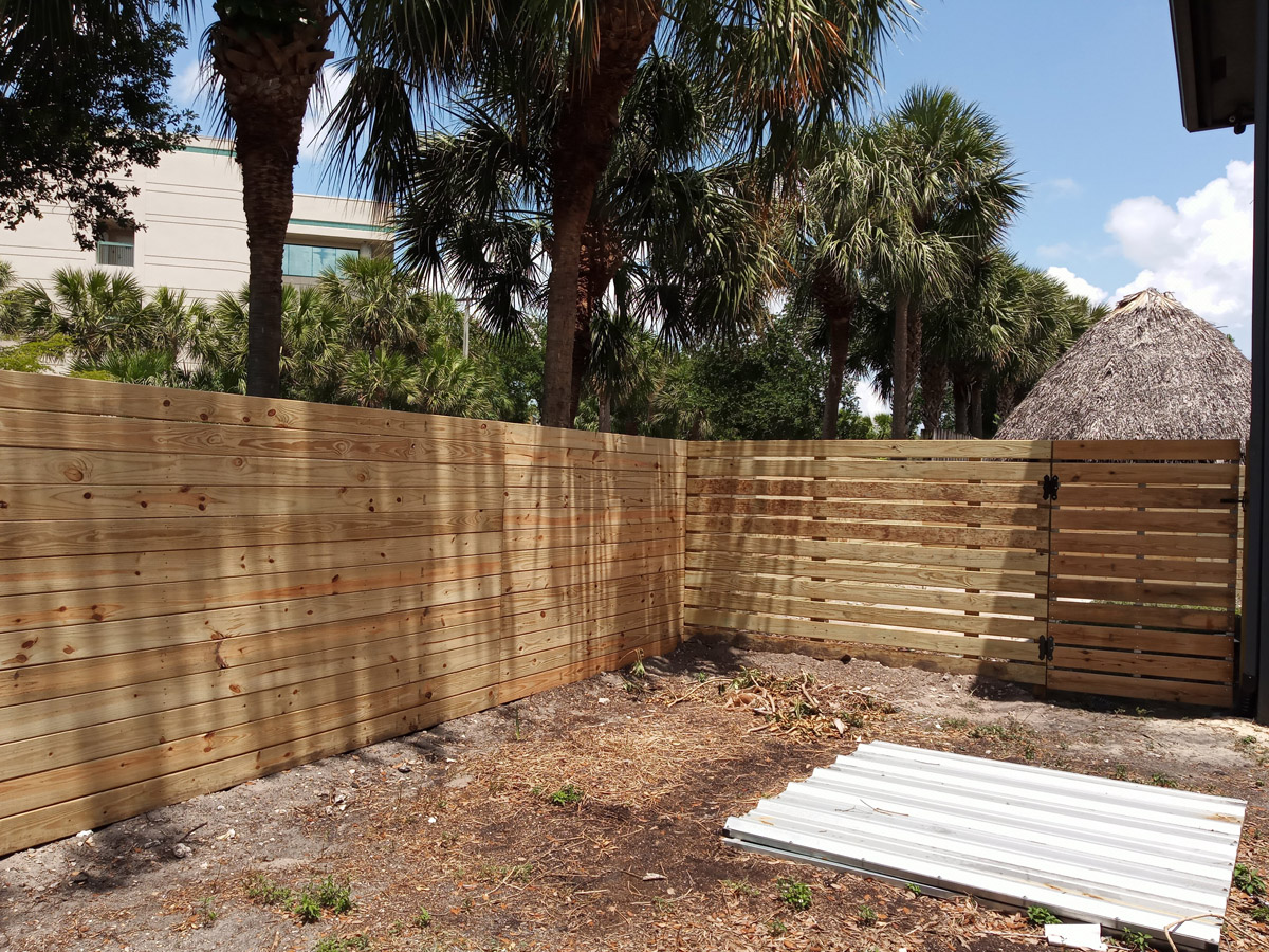 Installation of the Wooden Fence with Horizontal Pattern, in Florida